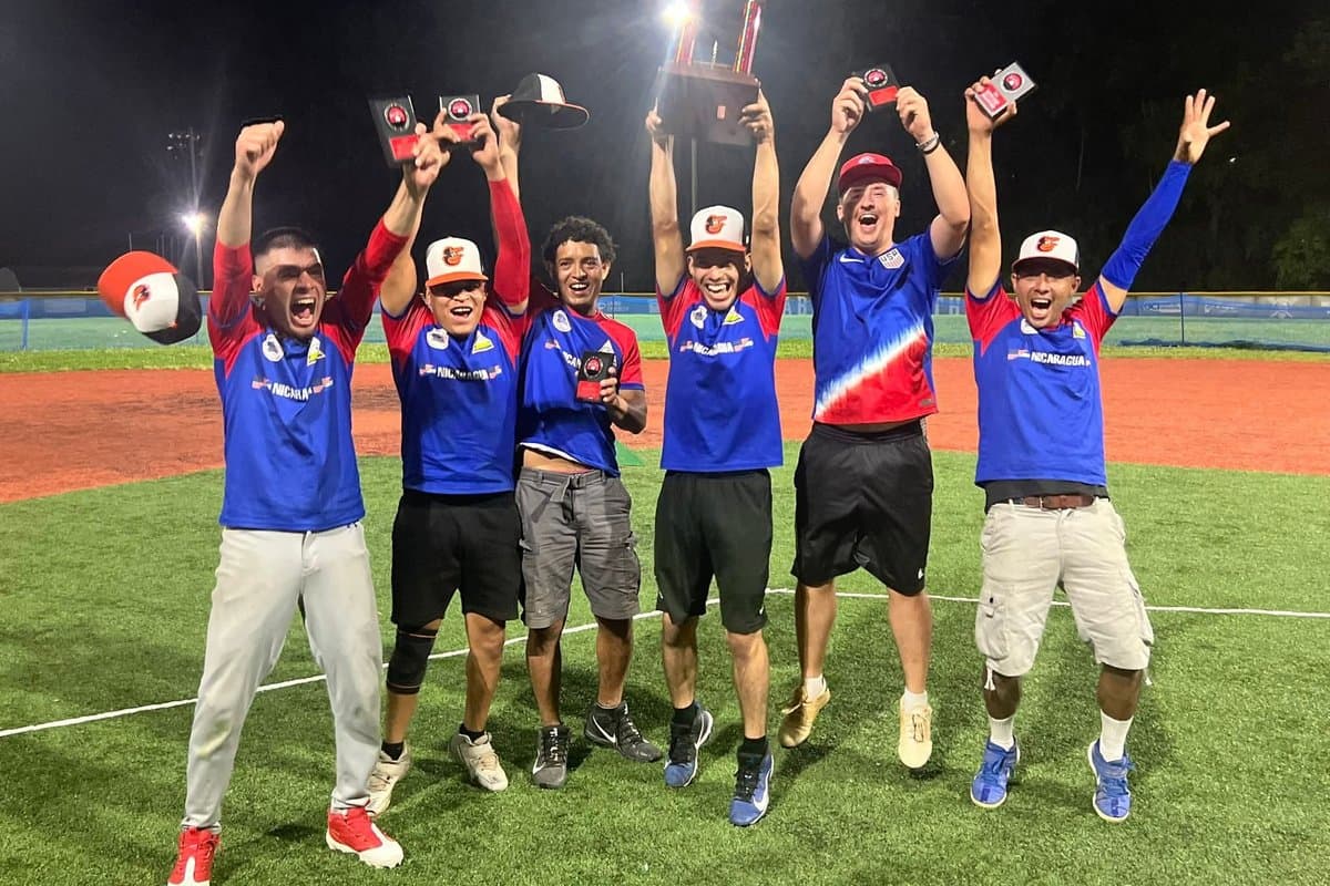 Champions celebrating with trophies